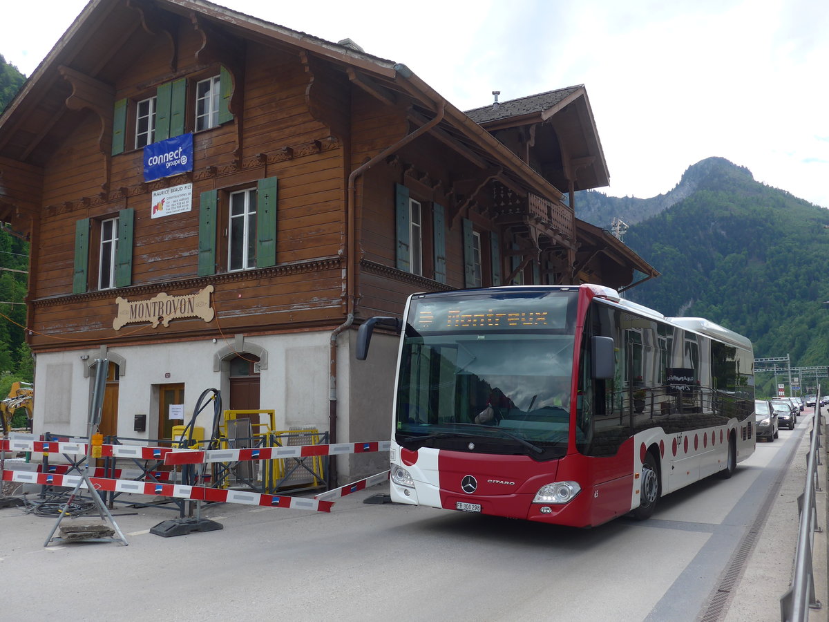 (193'314) - TPF Fribourg - Nr. 65/FR 300'298 - Mercedes am 21. Mai 2018 beim Bahnhof Montbovon