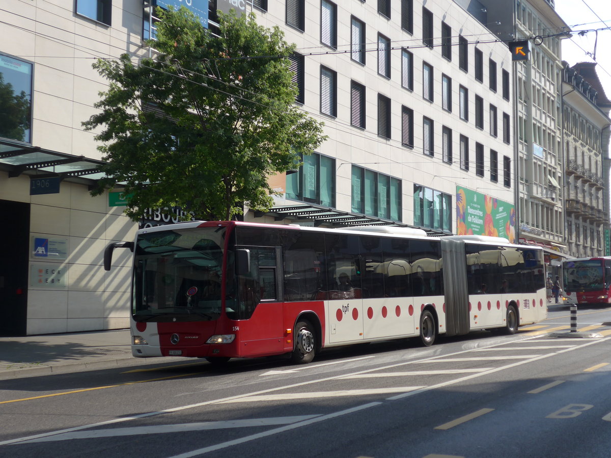 (195'650) - TPF Fribourg - Nr. 154/FR 300'231 - Mercedes am 5. August 2018 beim Bahnhof Fribourg