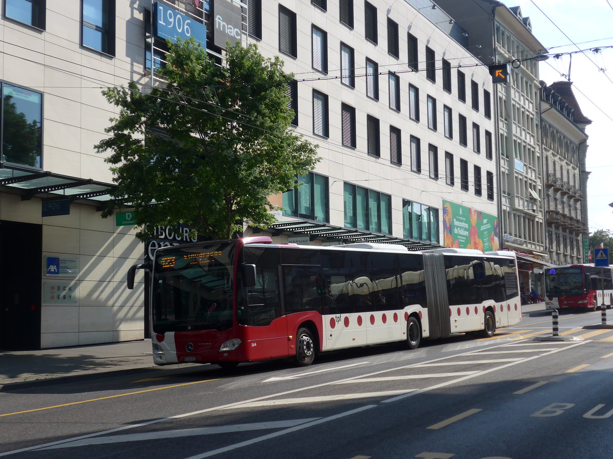 (195'652) - TPF Fribourg - Nr. 164/FR 300'283 - Mercedes am 5. August 2018 beim Bahnhof Fribourg