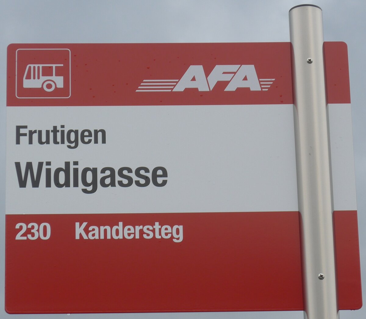 (198'075) - AFA-Haltestellenschild - Frutigen, Widigasse - am 1. Oktober 2018