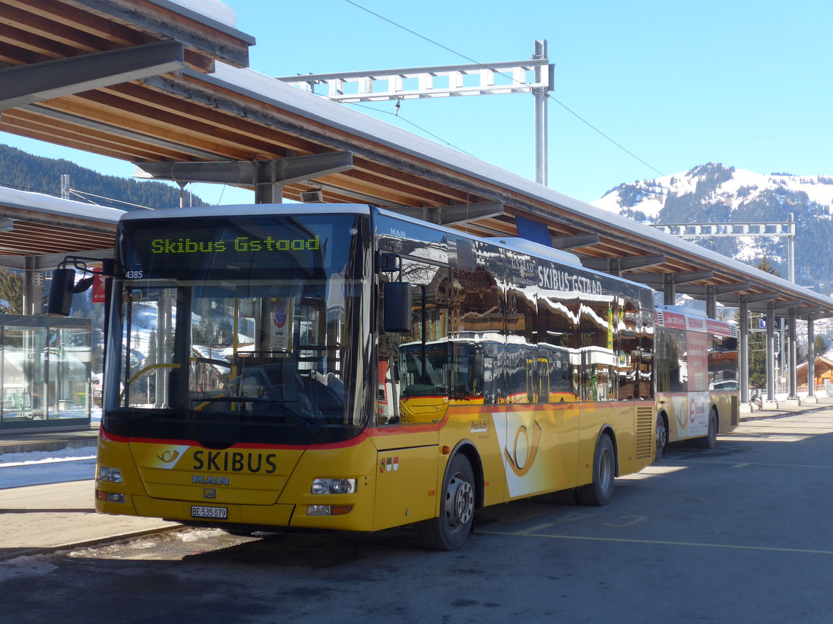 (201'689) - PostAuto Bern - BE 535'079 - MAN/Gppel (ex Nr. 217; ex RBS Worblaufen Nr. 217) am 17. Februar 2019 beim Bahnhof Gstaad