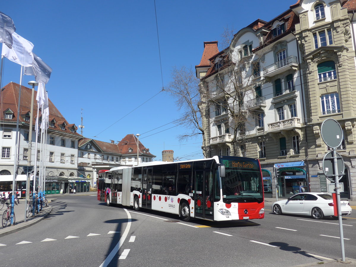 (203'233) - TPF Fribourg - Nr. 557/FR 300'413 - Mercedes am 24. Mrz 2019 beim Bahnhof Fribourg