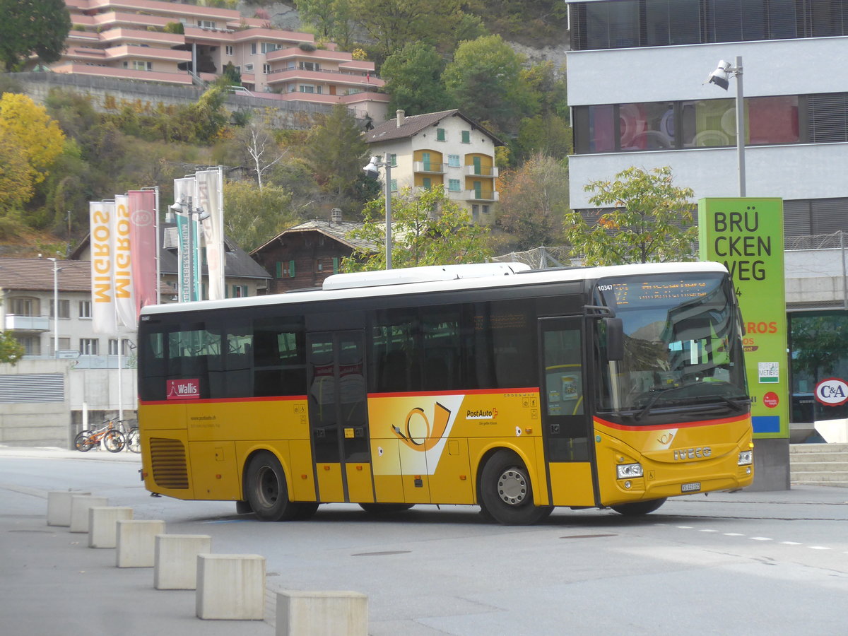 (210'662) - BUS-trans, Visp - VS 123'123 - Iveco am 27. Oktober 2019 beim Bahnhof Visp