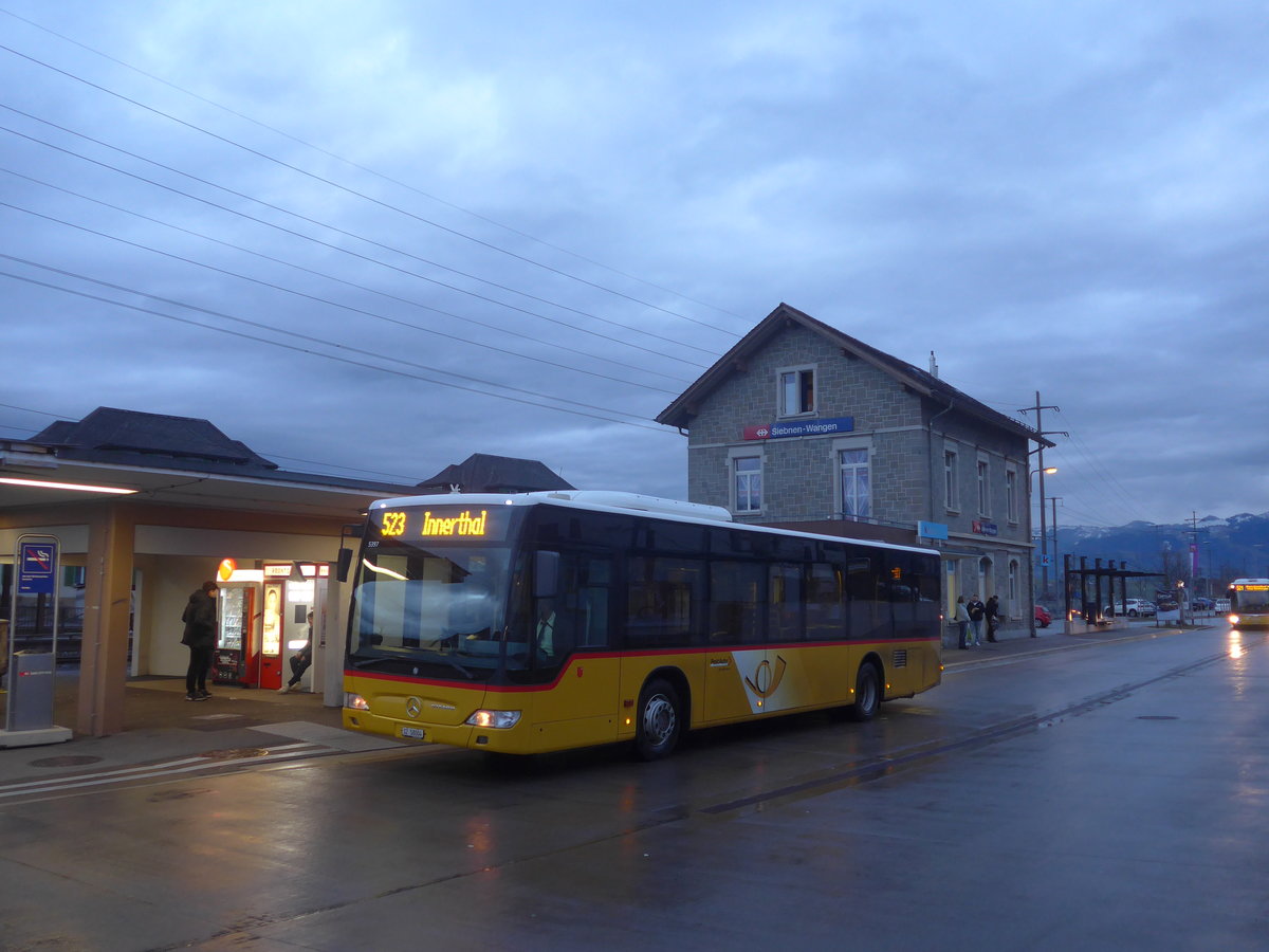 (214'076) - PostAuto Ostschweiz - SZ 58'004 - Mercedes (ex Kistler, Reichenburg) am 1. Februar 2020 beim Bahnhof Siebnen-Wangen
