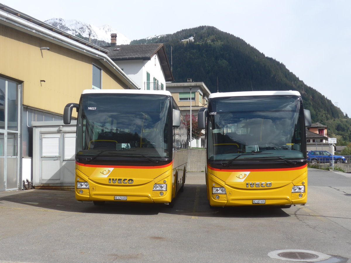 (221'517) - PostAuto Bern - BE 476'689 + BE 487'695 - Iveco am 26. September 2020 in Airolo, Garage Marchetti