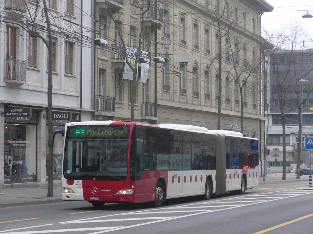(223'517) - TPF Fribourg - Nr. 597/FR 300'399 - Mercedes am 12. Februar 2021 beim Bahnhof Fribourg