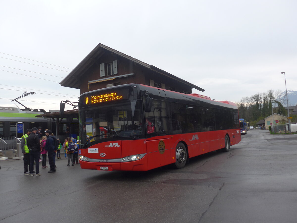 (225'238) - AFA Adelboden - Nr. 91/BE 26'704 - Solaris am 26. April 2021 beim Bahnhof Wimmis