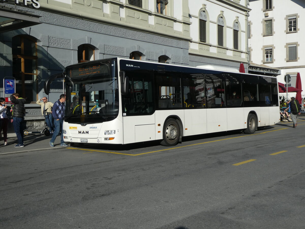 (228'803) - PostAuto Wallis - VS 449'117 - MAN am 10. Oktober 2021 beim Bahnhof Brig