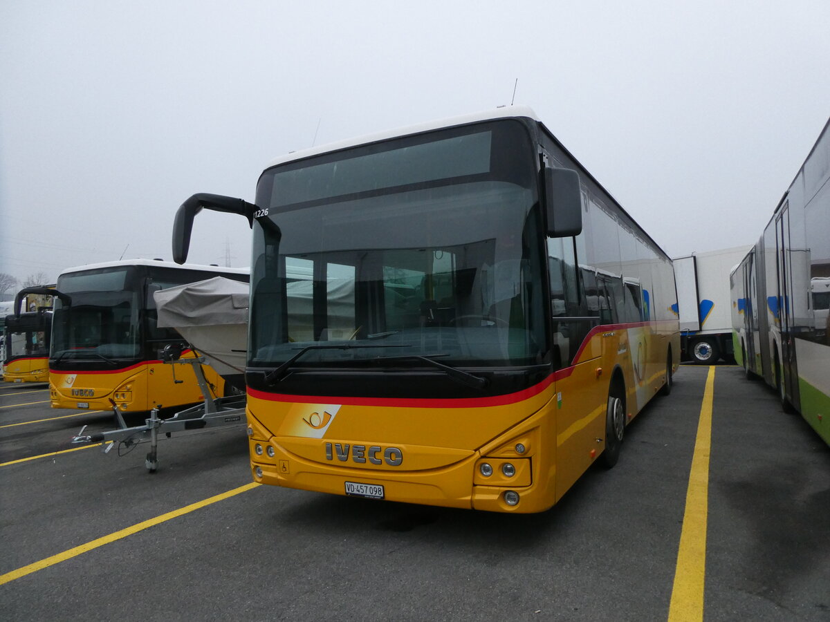 (231'507) - CarPostal Ouest - VD 457'098 - Iveco am 19. Dezember 2021 in Kerzers, Interbus