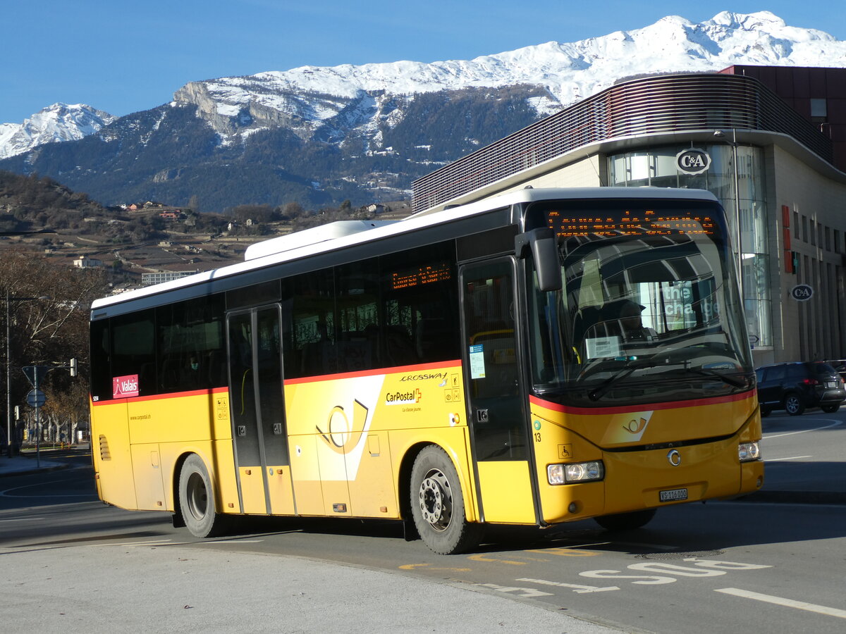 (231'653) - PostAuto Wallis - Nr. 13/VS 116'00 - Irisbus (ex Theytaz, Sion) am 1. Januar 2022 beim Bahnhof Sion