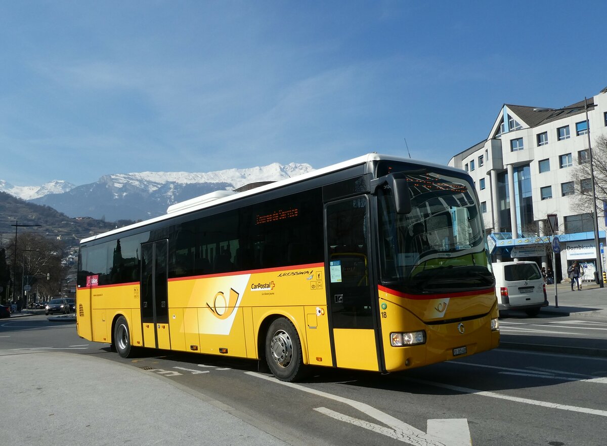 (233'456) - PostAuto Wallis - Nr. 18/VS 365'408 - Irisbus am 7. Mrz 2022 beim Bahnhof Sion