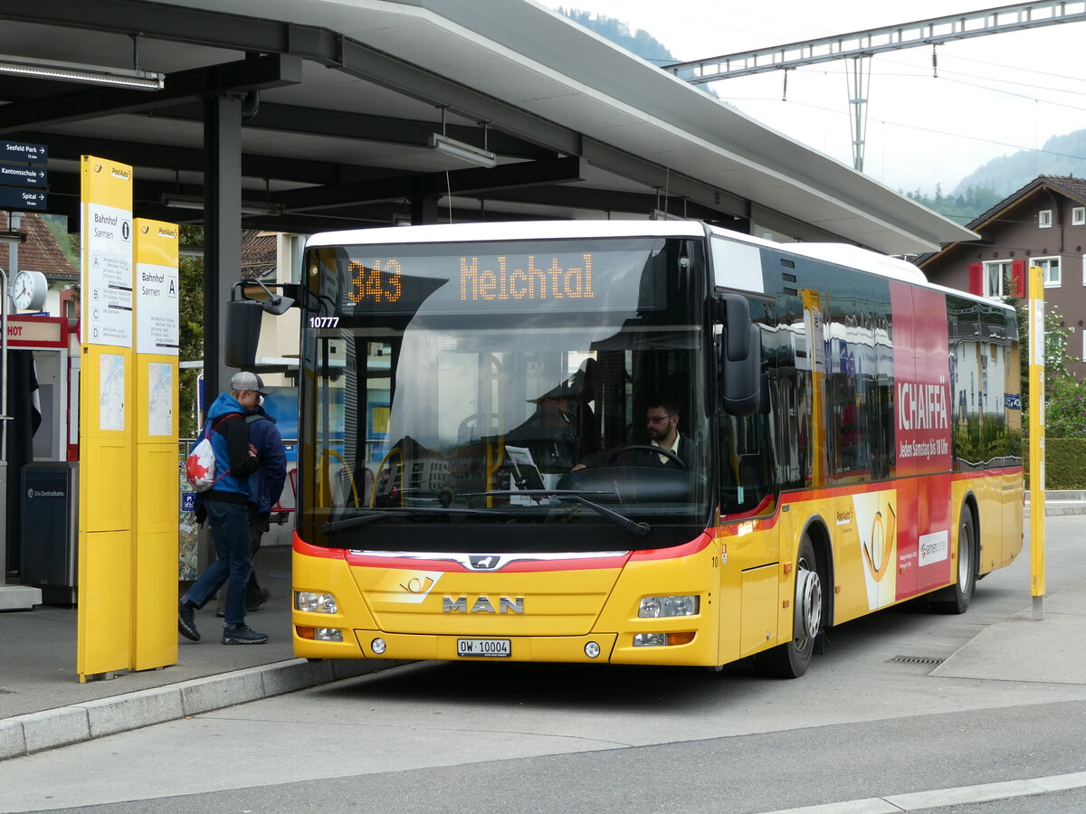 (235'451) - PostAuto Zentralschweiz - Nr. 10/OW 10'004 - MAN (ex Dillier, Sarnen Nr. 10) am 8. Mai 2022 beim Bahnhof Sarnen