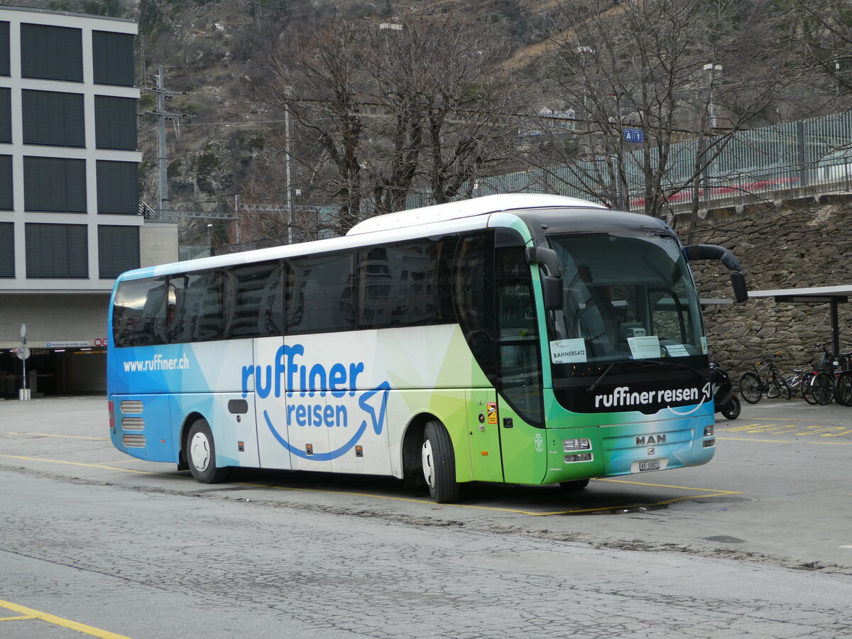 (243'796) - Ruffiner, Turtmann - VS 10'821 - MAN (ex Nr. 11) am 11. Dezember 2022 beim Bahnhof Brig