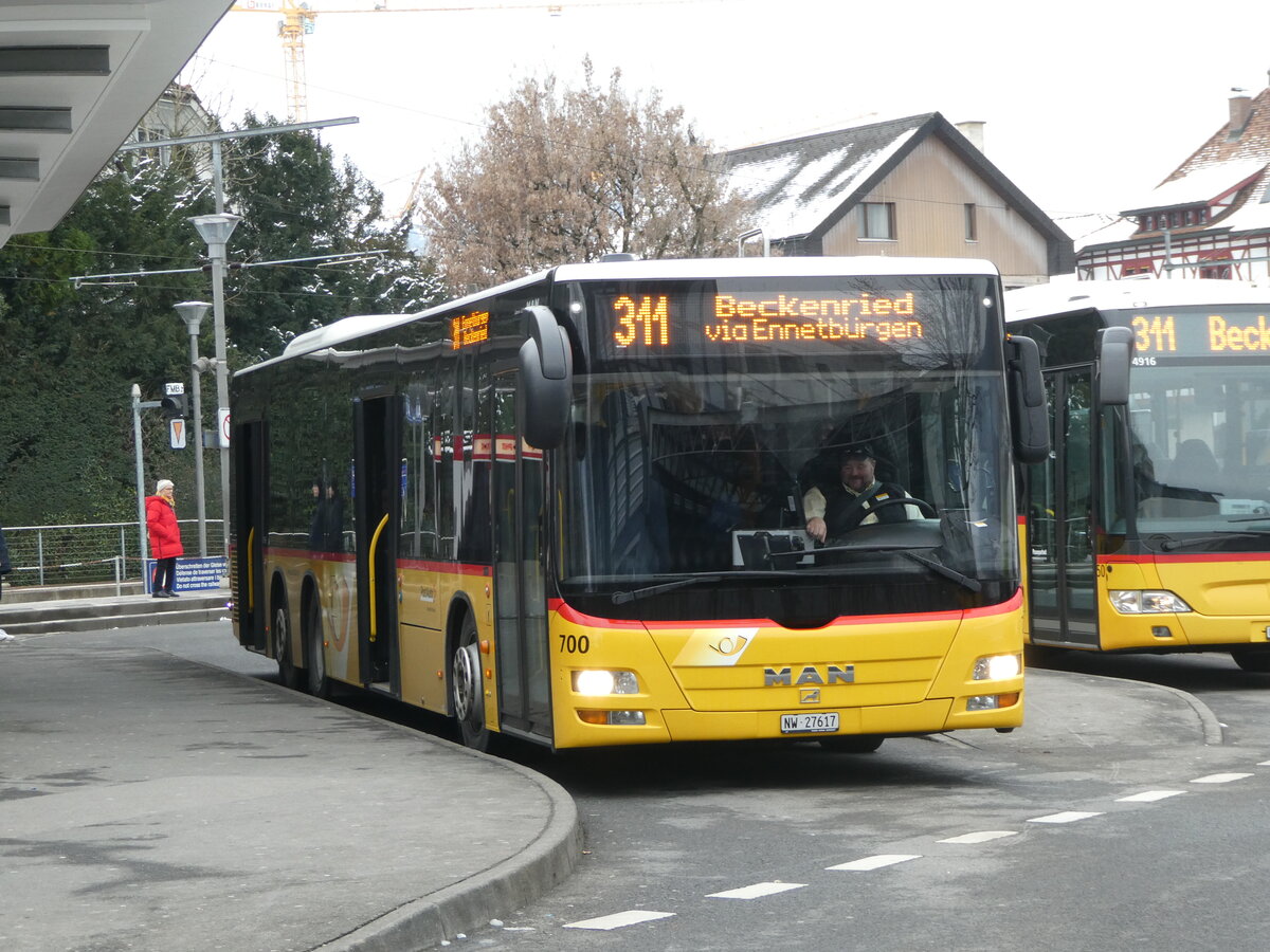 (245'392) - PostAuto Zentralschweiz - Nr. 700/NW 27'617/PID 5569 - MAN (ex Niederer, Filzbach Nr. 12; ex PostAuto Ostschweiz) am 25. Januar 2023 beim Bahnhof Stans