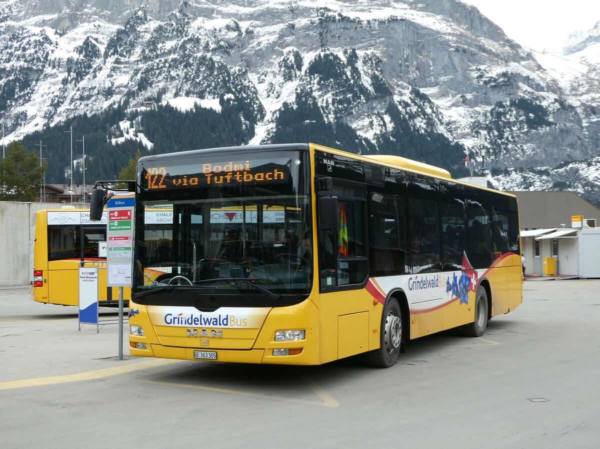 (246'228) - Grindelwaldbus, Grindelwald - Nr. 19/BE 363'305 - MAN/Gppel am 17. Februar 2023 beim Bahnhof Grindelwald