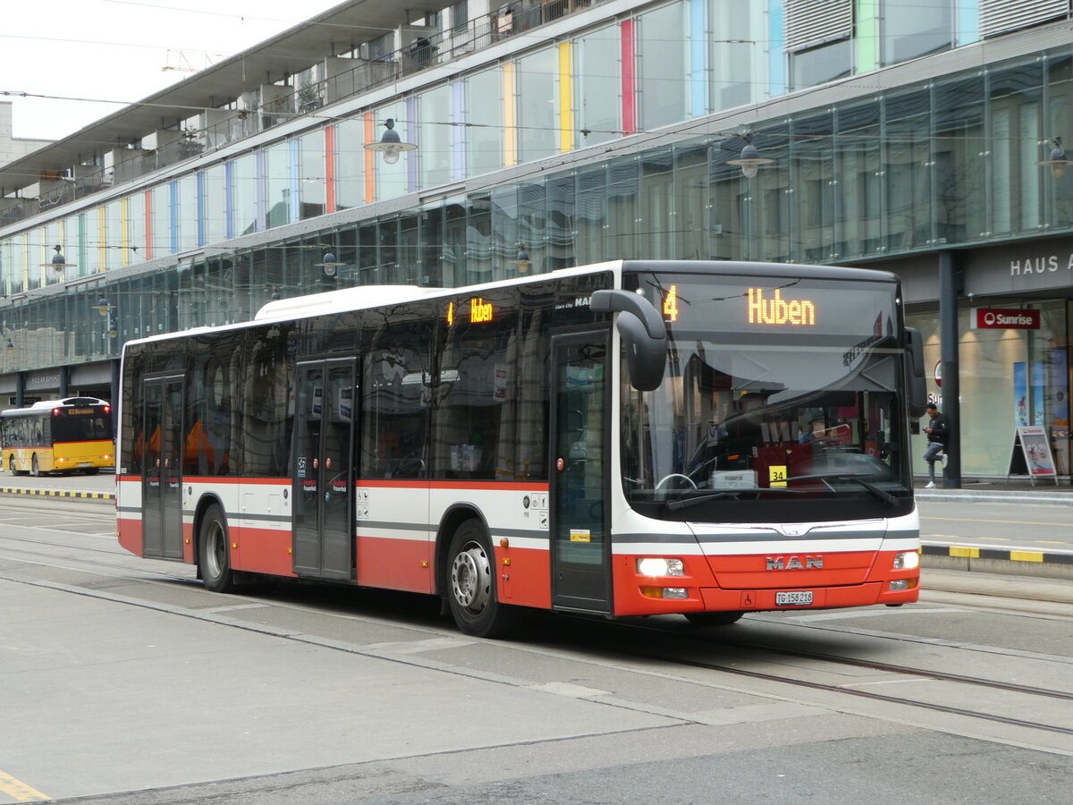 (246'585) - PostAuto Ostschweiz - TG 158'218/PID 10'033 - MAN am 25. Februar 2023 beim Bahnhof Frauenfeld