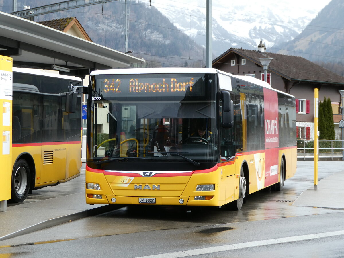 (247'130) - PostAuto Zentralschweiz - Nr. 504/OW 10'004/PID 10'777 - MAN (ex Nr. 10; ex Dillier, Sarnen Nr. 10) am 10. Mrz 2023 beim Bahnhof Sarnen