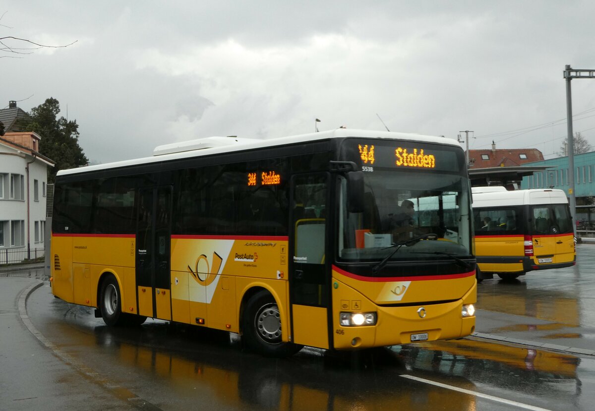 (247'586) - PostAuto Zentralschweiz - Nr. 406/OW 10'006/PID 5538 - Irisbus (ex Nr. 3; ex Dillier, Sarnen Nr. 3) am 24. Mrz 2023 beim Bahnhof Sarnen