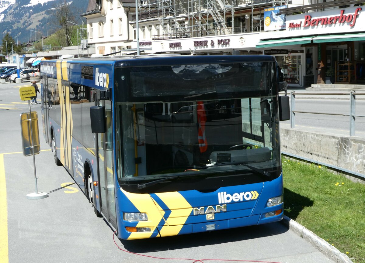 (248'783) - STI Thun - Nr. 128 - MAN am 18. April 2023 beim Bahnhof Grindelwald