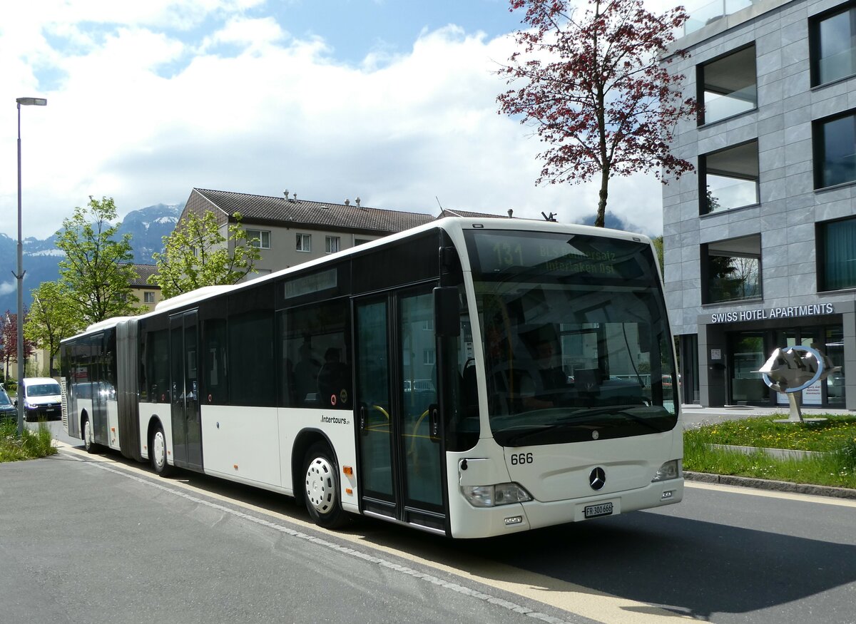 (249'388) - Intertours, Domdidier - Nr. 666/FR 300'666 - Mercedes (ex STI Thun Nr. 136) am 2. Mai 2023 beim Bahnhof Interlaken Ost