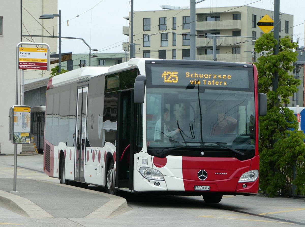 (250'293) - TPF Fribourg - Nr. 1051/FR 300'304 - Mercedes am 20. Mai 2023 beim Bahnhof Ddingen
