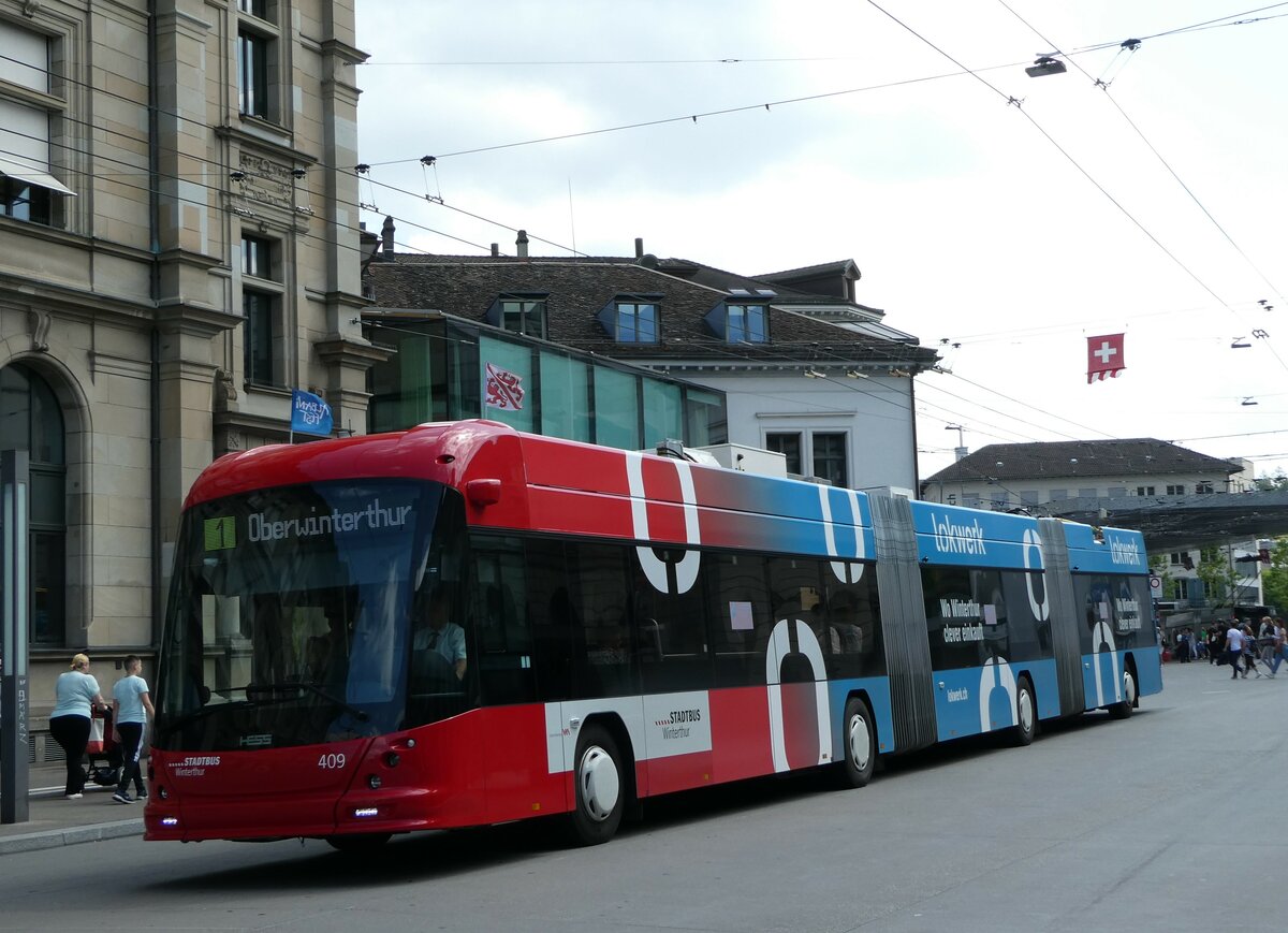 (252'313) - SW Winterthur - Nr. 409 - Hess/Hess Doppelgelenktrolleybus am 2. Juli 2023 beim Hauptbahnhof Winterthur