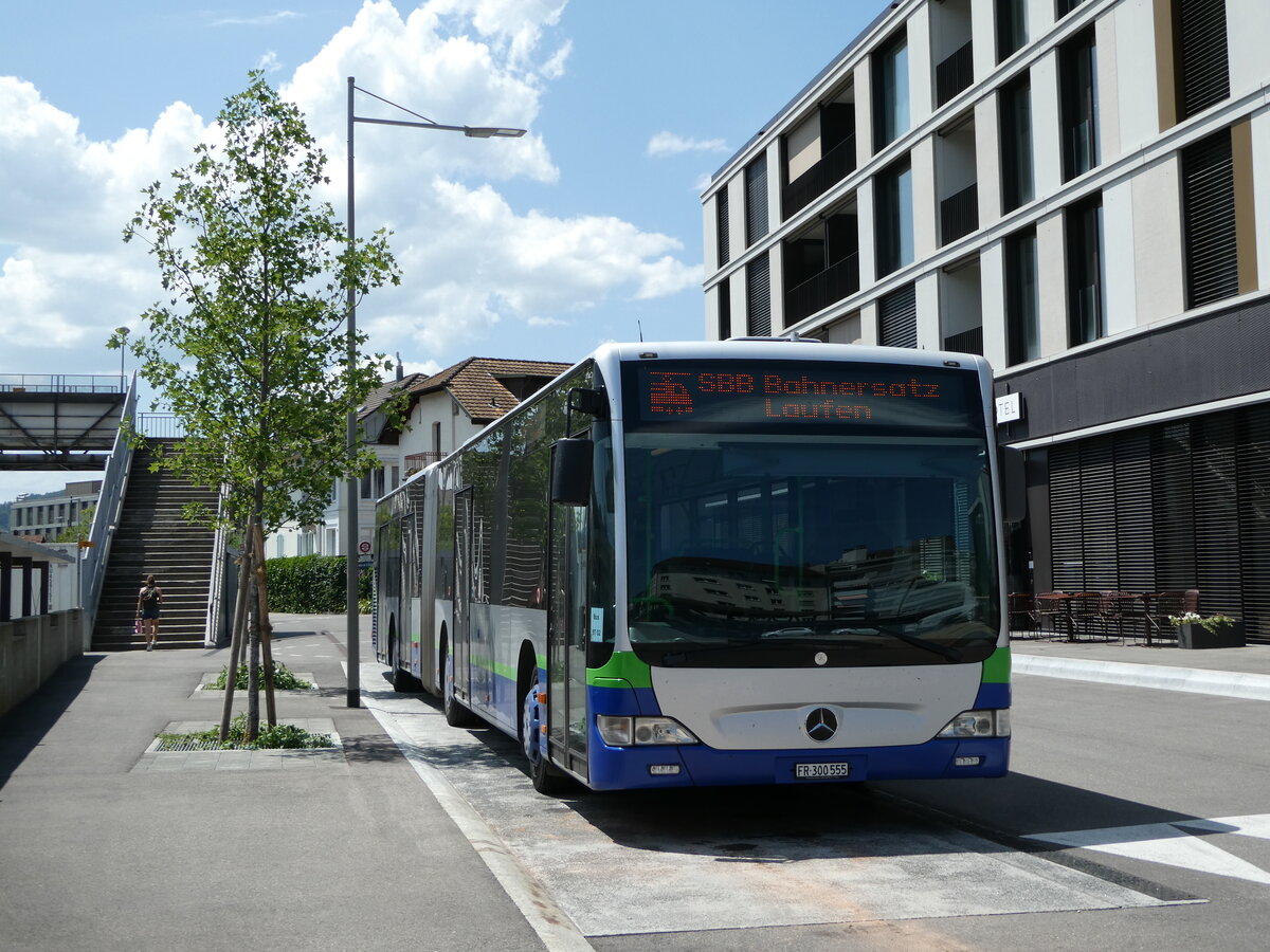 (252'440) - Intertours, Domdidier - Nr. 555/FR 300'555 - Mercedes (ex Nr. 412; ex TPL Lugano Nr. 412) am 7. Juli 2023 beim Bahnhof Delmont