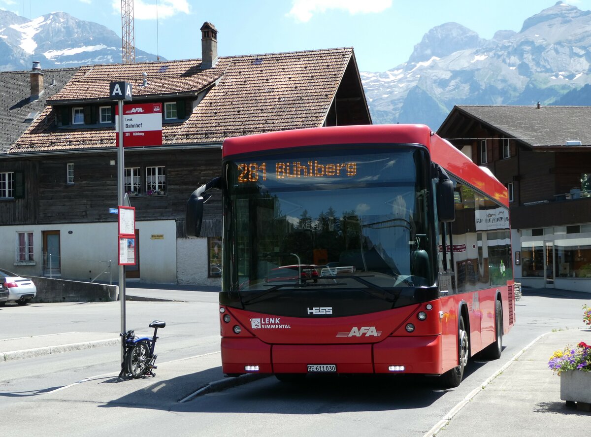 (252'632) - AFA Adelboden - Nr. 56/BE 611'030 - Scania/Hess am 11. Juli 2023 beim Bahnhof Lenk