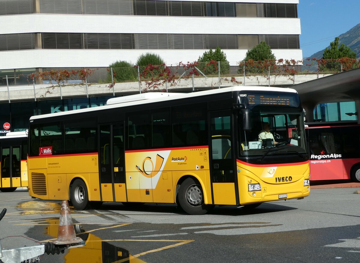 (253'818) - BUS-trans, Visp - VS 123'123/PID 10'347 - Iveco am 15. August 2023 beim Bahnhof Visp