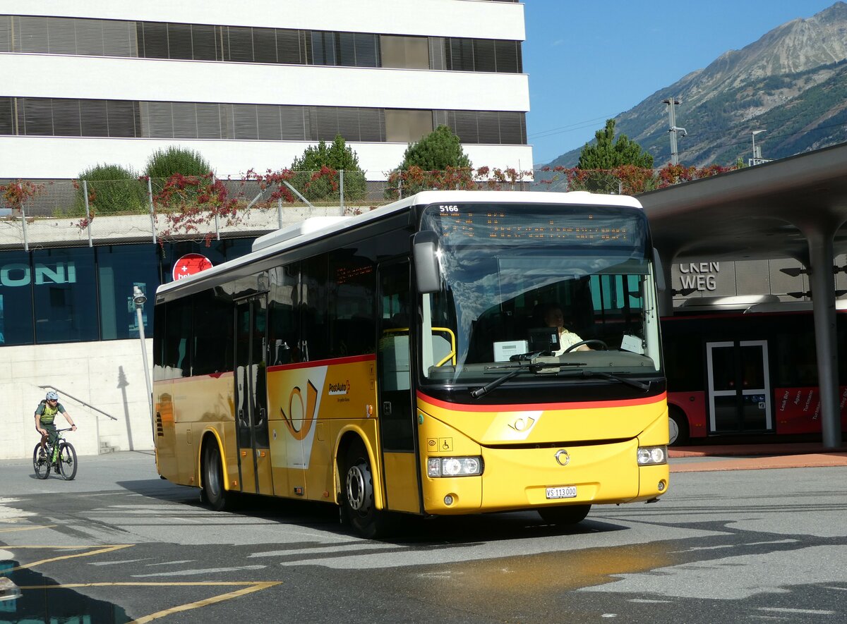 (253'819) - BUS-trans, Visp - VS 113'000/PID 5166 - Irisbus am 15. August 2023 beim Bahnhof Visp