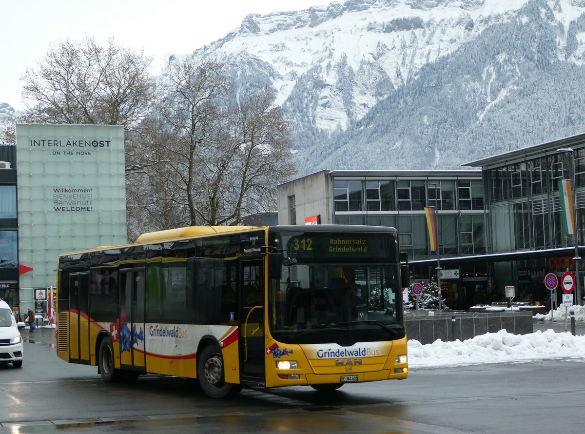 (257'422) - Grindelwaldbus, Grindelwald - Nr. 24/BE 364'408 - MAN/Gppel am 4. Dezember 2023 beim Bahnhof Interlaken Ost