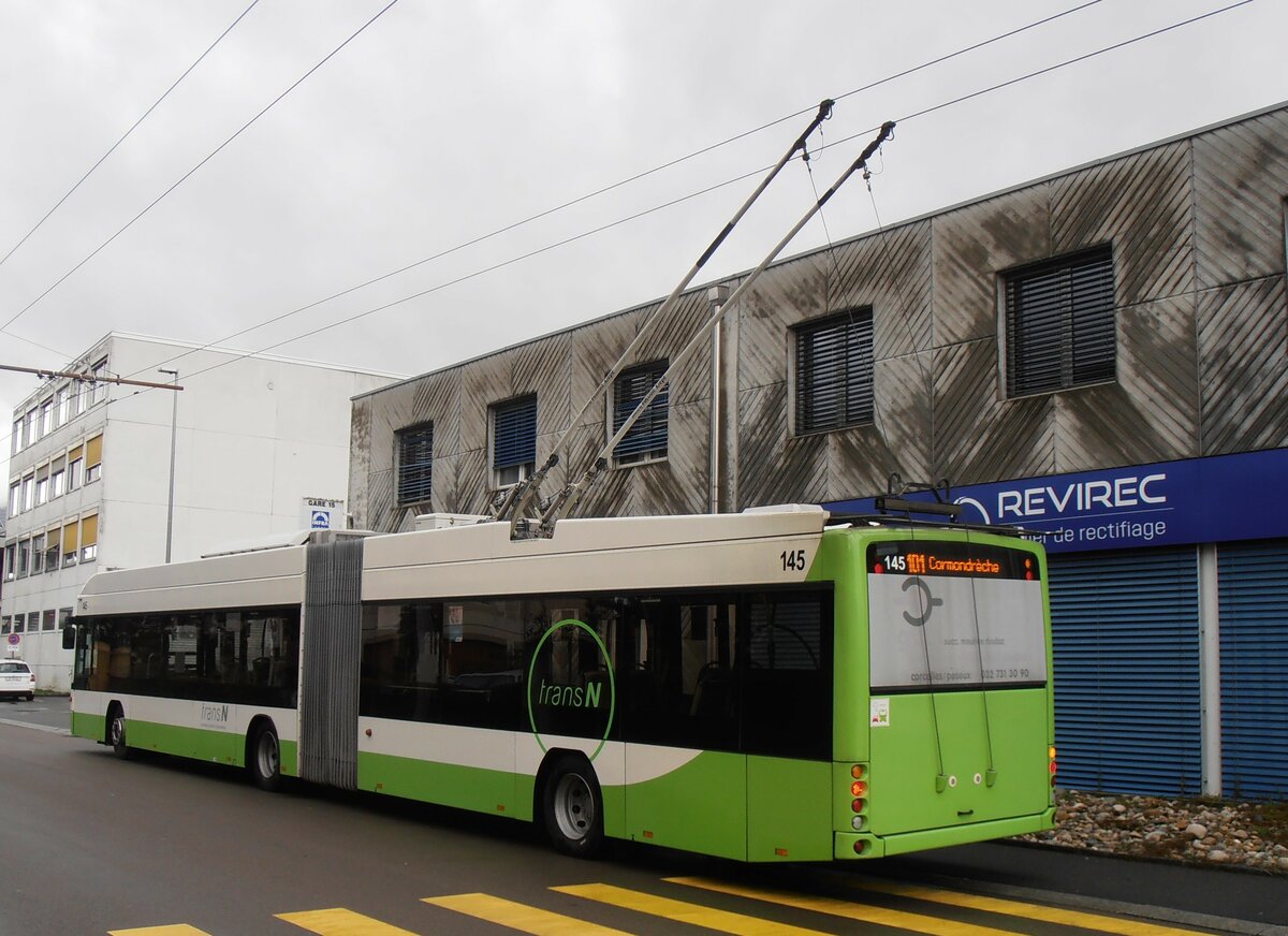 (257'554) - transN, La Chaux-de-Fonds - Nr. 145 - Hess/Hess Gelenktrolleybus (ex TN Neuchtel Nr. 145) am 11. Dezember 2023 beim Bahnhof Marin-pagnier