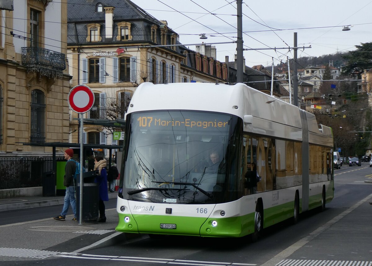 (258'917) - transN, La Chaux-de-Fonds - Nr. 166/NE 209'166 - Hess/Hess Gelenktrolleybus am 26. Januar 2024 in Neuchtel, Place Pury
