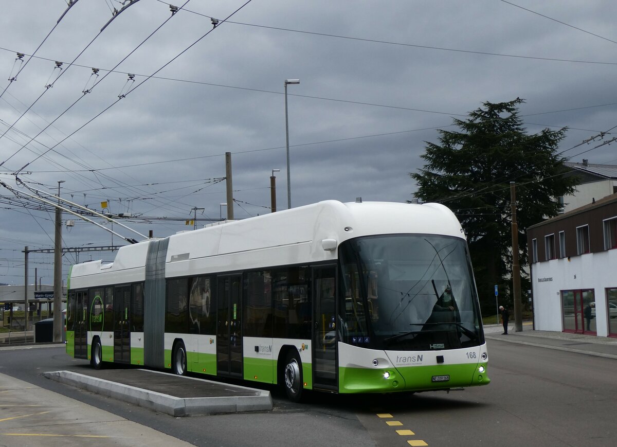 (258'965) - transN, La Chaux-de-Fonds - Nr. 168/NE 209'168 - Hess/Hess Gelenktrolleybus am 26. Januar 2024 beim Bahnhof Marin-pagnier