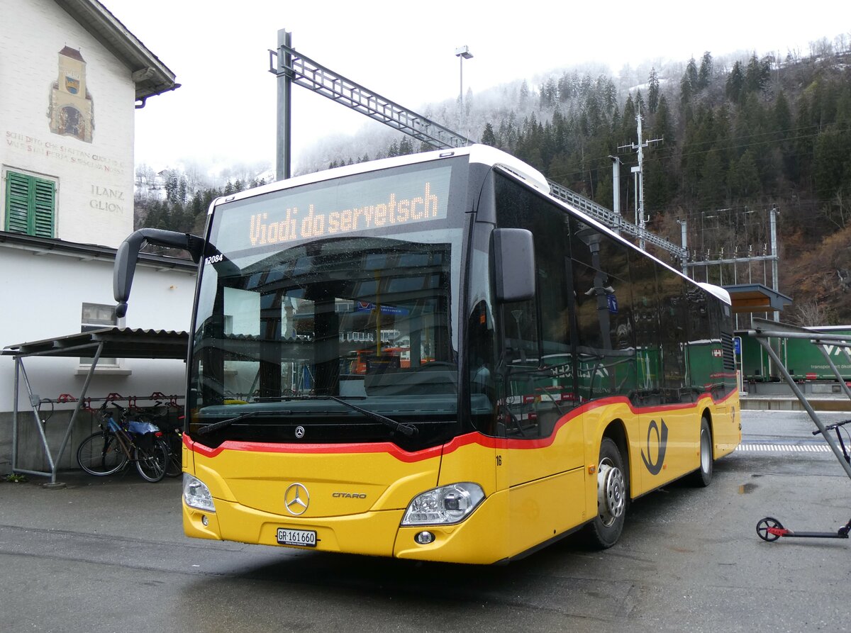 (259'555) - PostAuto Graubnden - Nr. 16/GR 161'660/PID 12'084 - Mercedes am 23. Februar 2024 beim Bahnhof Ilanz