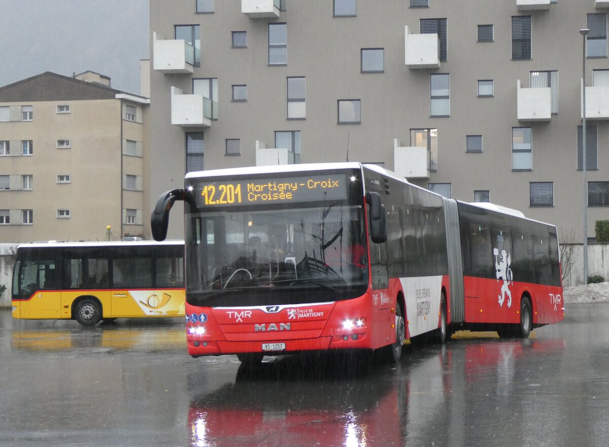 (269'988) - TMR Martigny - Nr. 152/VS 1257 - MAN am 19. Dezember 2024 beim Bahnhof Martigny