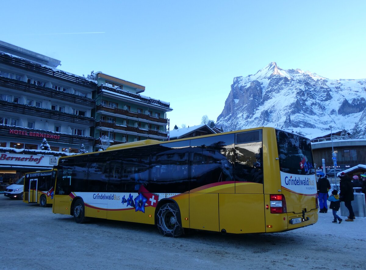 (270'325) - GrindelwaldBus, Grindelwald - Nr. 14/BE 202'568 - MAN/Gppel am 29. Dezember 2024 beim Bahnhof Grindelwald