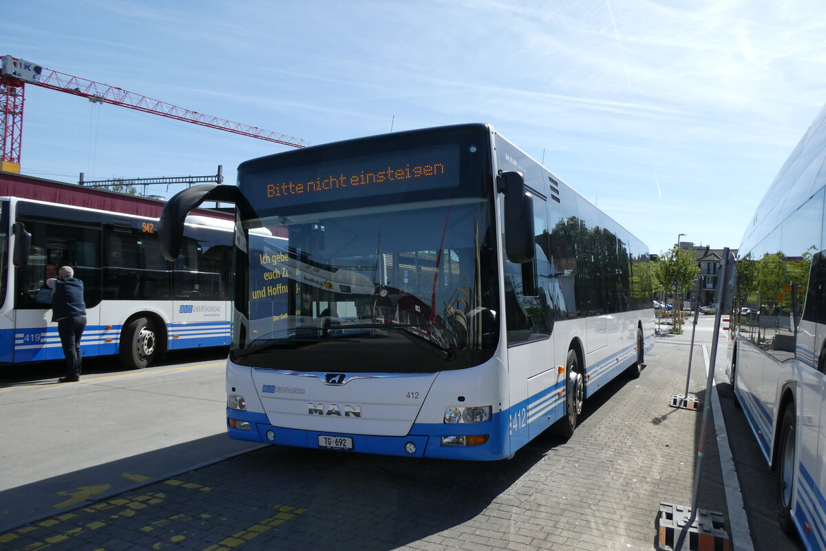 (287'129) - BOTG Amriswil - Nr. 412/TG 692 - MAN am 21. Mai 2026 beim Bahnhof Amriswil