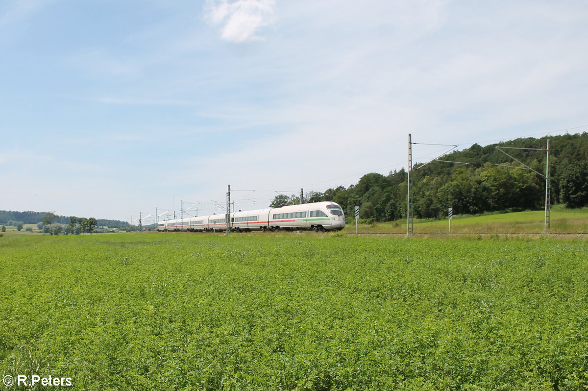 411 069  Tutzing  als ICE93 Hamburg - Wien bei Oberdachstetten. 08.06.24
