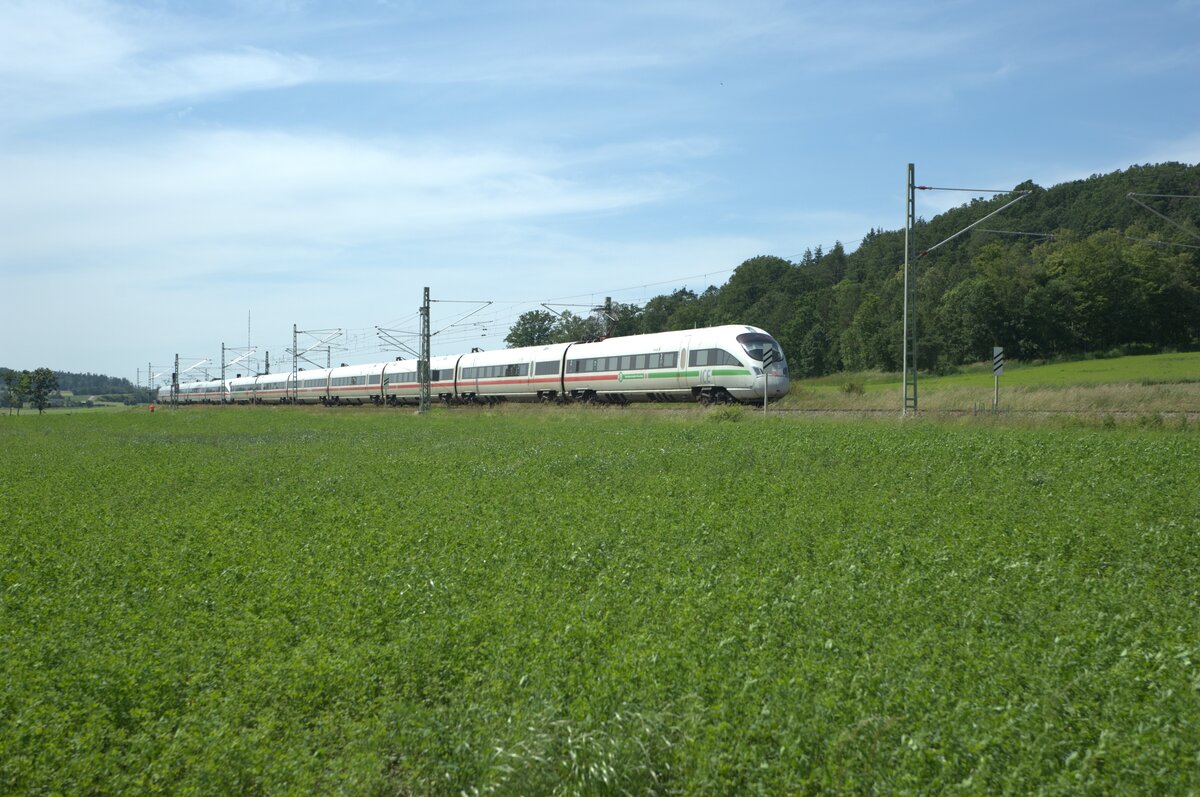 411 069  Tutzing  als ICE93 Hamburg - Wien bei Oberdachstetten. 08.06.24