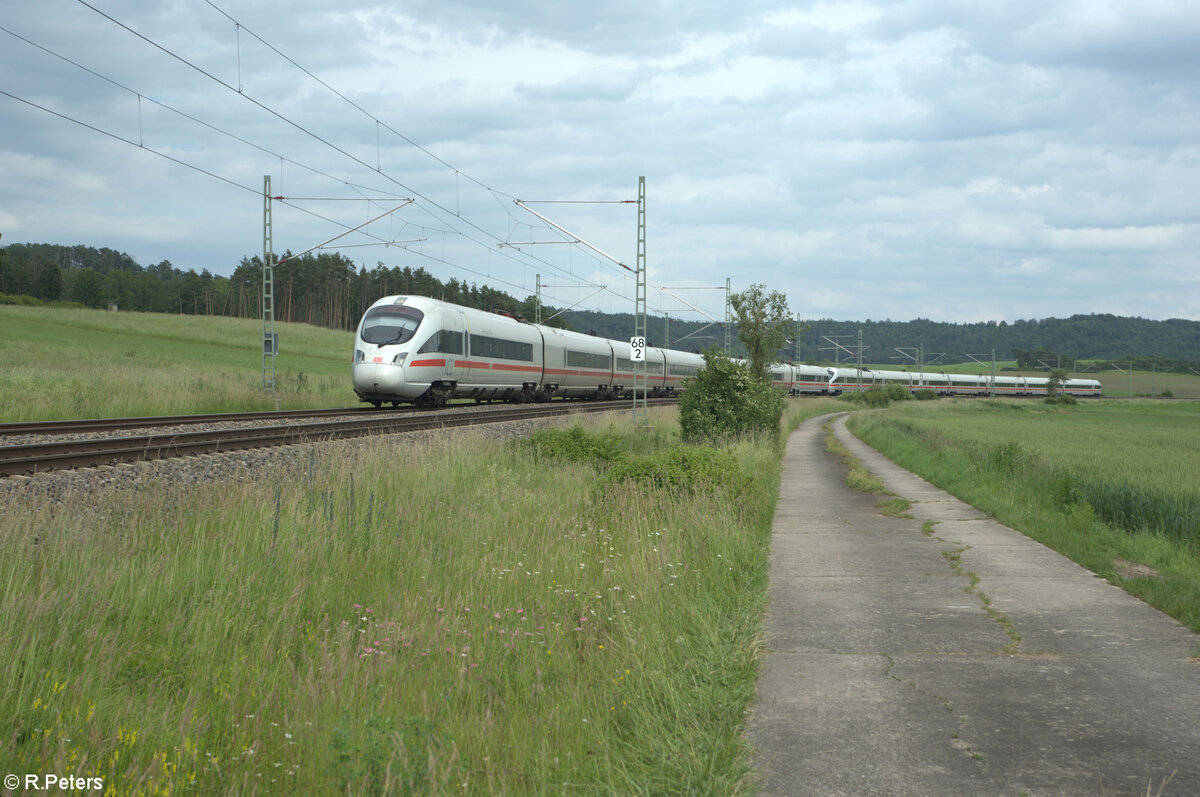 411 074  Hansestadt Warburg  + 411 009 als ICE 92 Wien - Hamburg bei Oberdachstetten. 08.06.24 