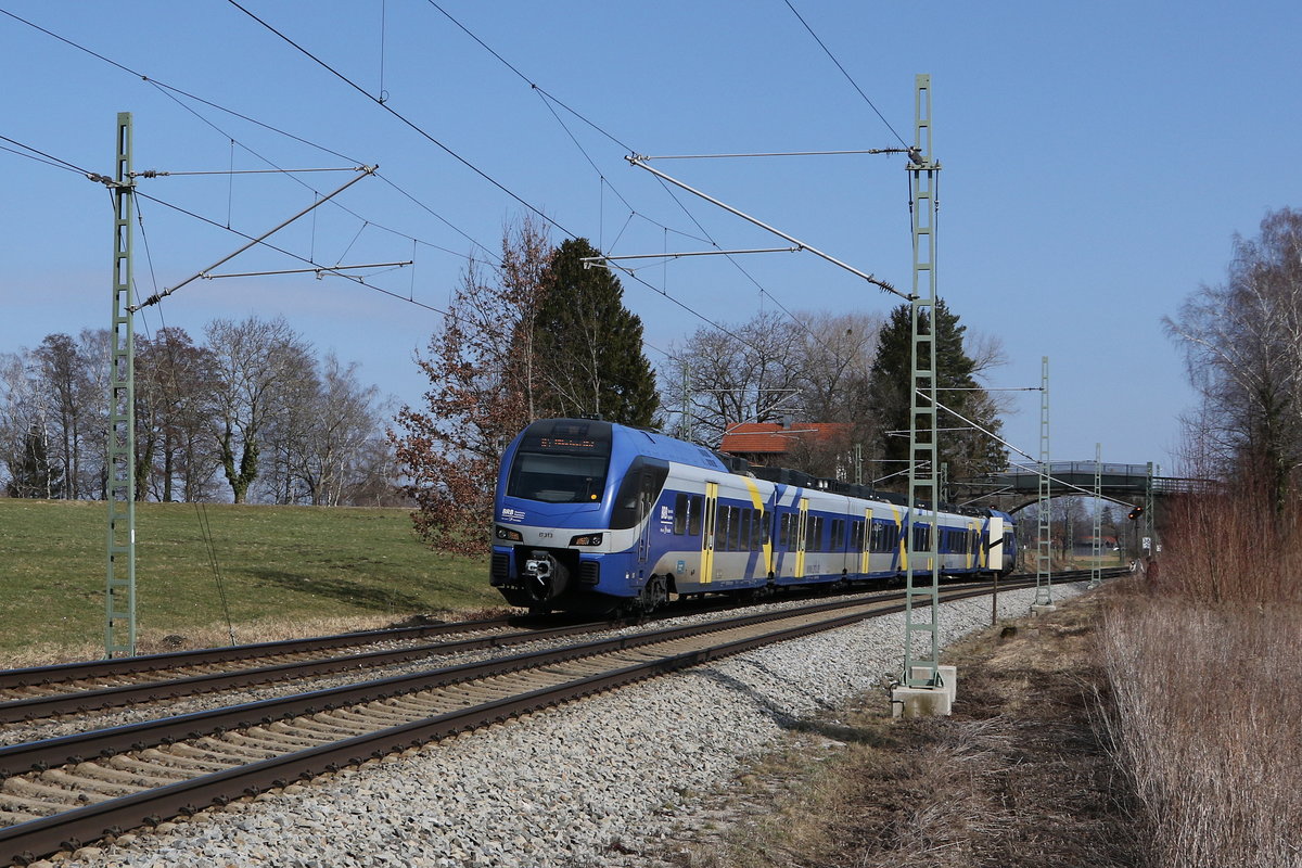 ET 313 aus Salzburg kommend am 7. M�rz 021 bei �bersee am Chiemsee.