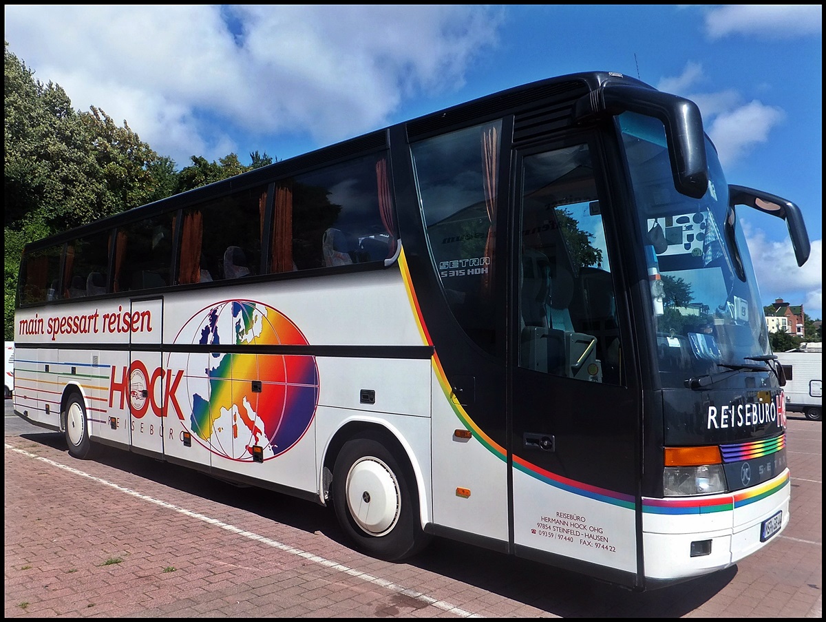 Setra 315 HDH vom Reisebro Hock aus Deutschland im Stadthafen Sassnitz.