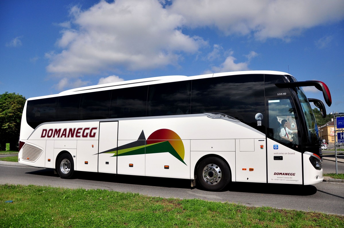 Setra 515 HD von Domaneg Reisen aus Italien am 24. Mai 2014 in Krems unterwegs.