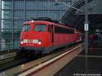 110 410-8 brachte den ersten Sonderzug zum DGB Streik von Basel Bad Bf im Regen nach Berlin.