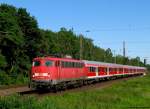 Mit der RB 30528 von K�ln nach Wesel f�hrt 110 435-5 in Dinslaken ein. Mai 2012