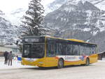 (223'154) - Grindelwaldbus, Grindelwald - Nr. 12/BE 356'085 - MAN am 27. Dezember 2020 beim Bahnhof Grindelwald