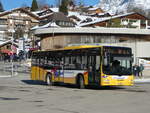 (232'889) - Grindelwaldbus, Grindelwald - Nr. 16/BE 28'821 - MAN am 13. Februar 2022 beim Bahnhof Grindelwald