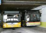 (248'828) - Grindelwaldbus, Grindelwald - Nr. 16/BE 28'821 - MAN + Nr. 17/BE 72'444 - MAN/G�ppel (ex STI Thun Nr. 133) am, 18. April 2023 in Grindelwald, Garage