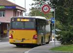 (267'616) - Funi-Car, Biel - Nr. 18/BE 610'618/PID 5709 - MAN am 1. Oktober 2024 beim Bahnhof Marin-pagnier